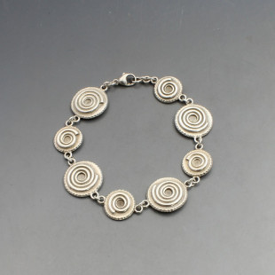Designer Silver Swirls Link Bracelet