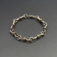 Designer Silver Bows Link Bracelet