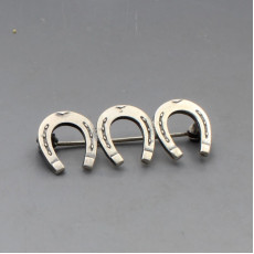 NE From Silver Triple Horseshoe Brooch