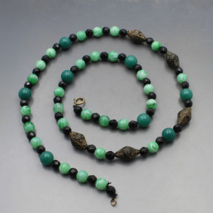 Art Deco Style Green and Black Glass Beads