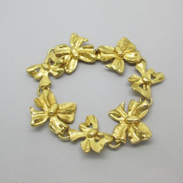 Yves Saint Laurent Gold Bow Design Bracelet