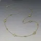 Long Clear Quartz Necklace in Gold
