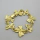 Yves Saint Laurent Gold Bow Design Bracelet