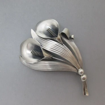 NE FROM silver flower and leaf brooch