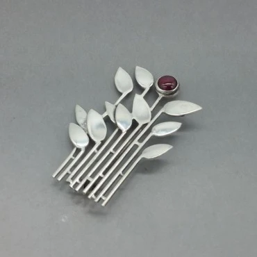 Beautiful Modernist Silver and Garnet Flower Brooch