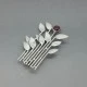 Beautiful Modernist Silver and Garnet Flower Brooch