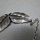 Niels Erik From Signature on Necklace