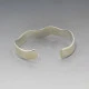 CRED Wavy Silver Bangle