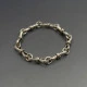 Designer Silver Bows Link Bracelet