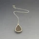 Rutilated Quartz and Silver Pendant