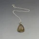 Rutilated Quartz and Silver Pendant