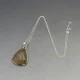 Rutilated Quartz and Silver Pendant