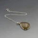 Rutilated Quartz and Silver Pendant