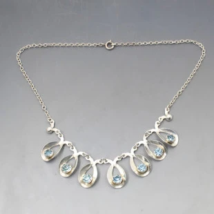 Hermann Siersbol  Silver and Light Blue Flower Necklace