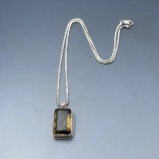 Rutilated Quartz and Sterling Silver Pendant