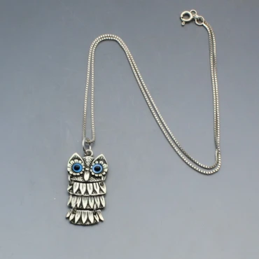 Silver Owl Pendant with Blue Eyes